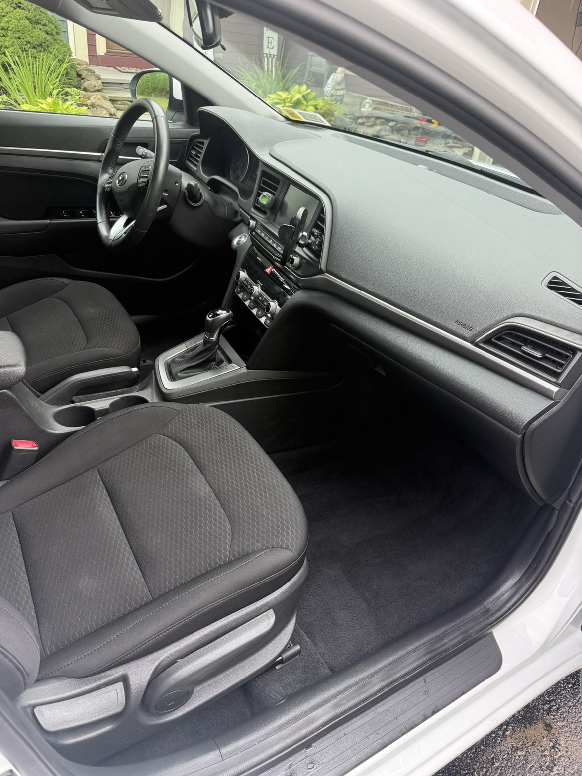 Detailed sedan dashboard and front seats
